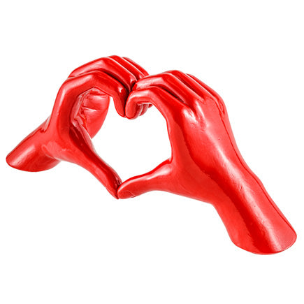 Scultura in resina MANI a CUORE , H. 11 cm.
